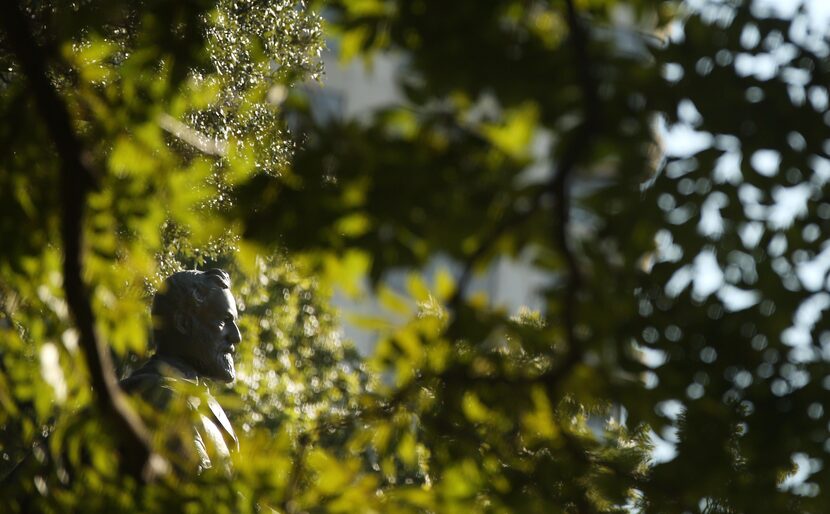 A statue of Confederate general Robert E. Lee (lower left) sits in Robert E. Lee Park in...