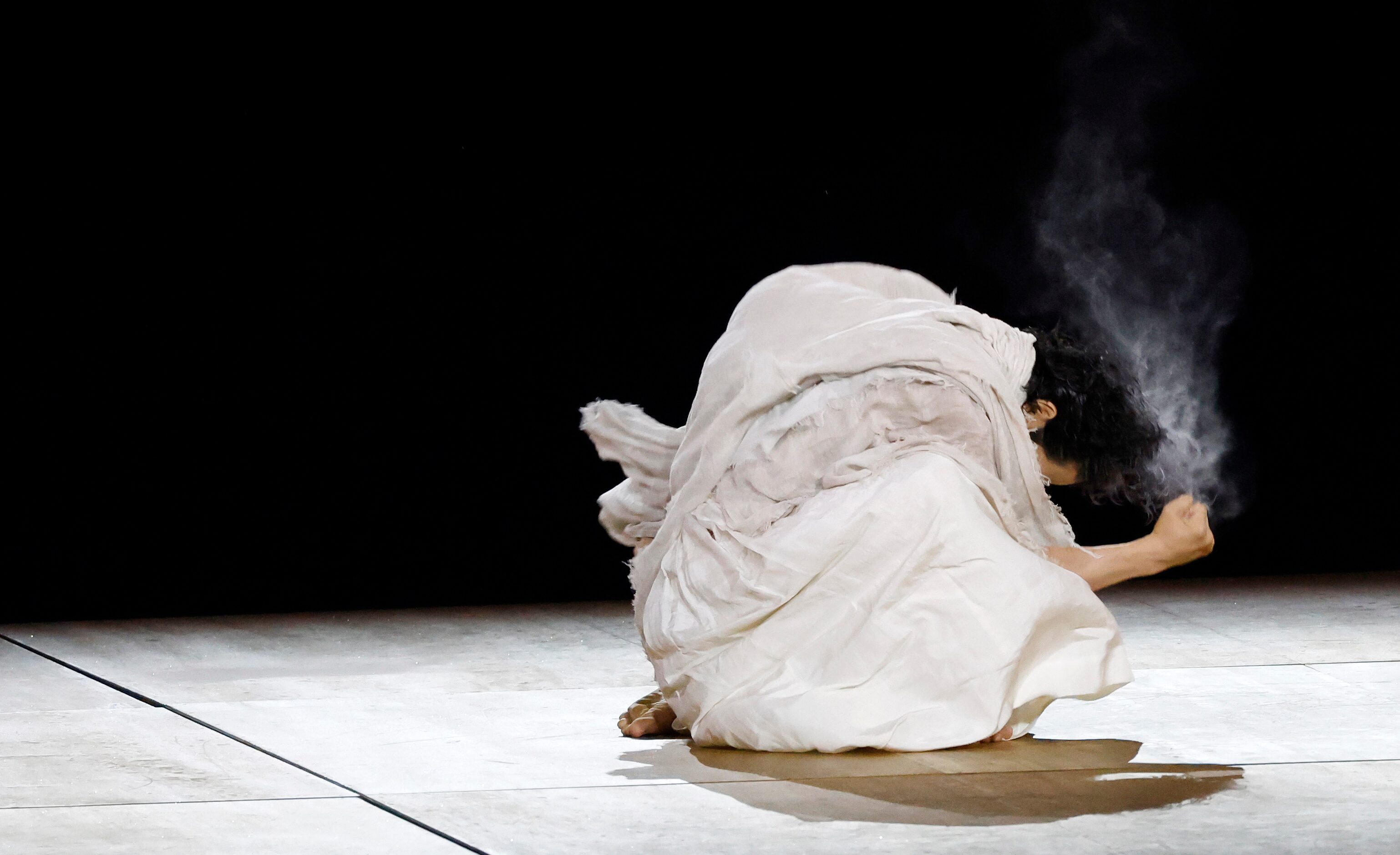 A dancer performs during the opening ceremony for the postponed 2020 Tokyo Olympics at...