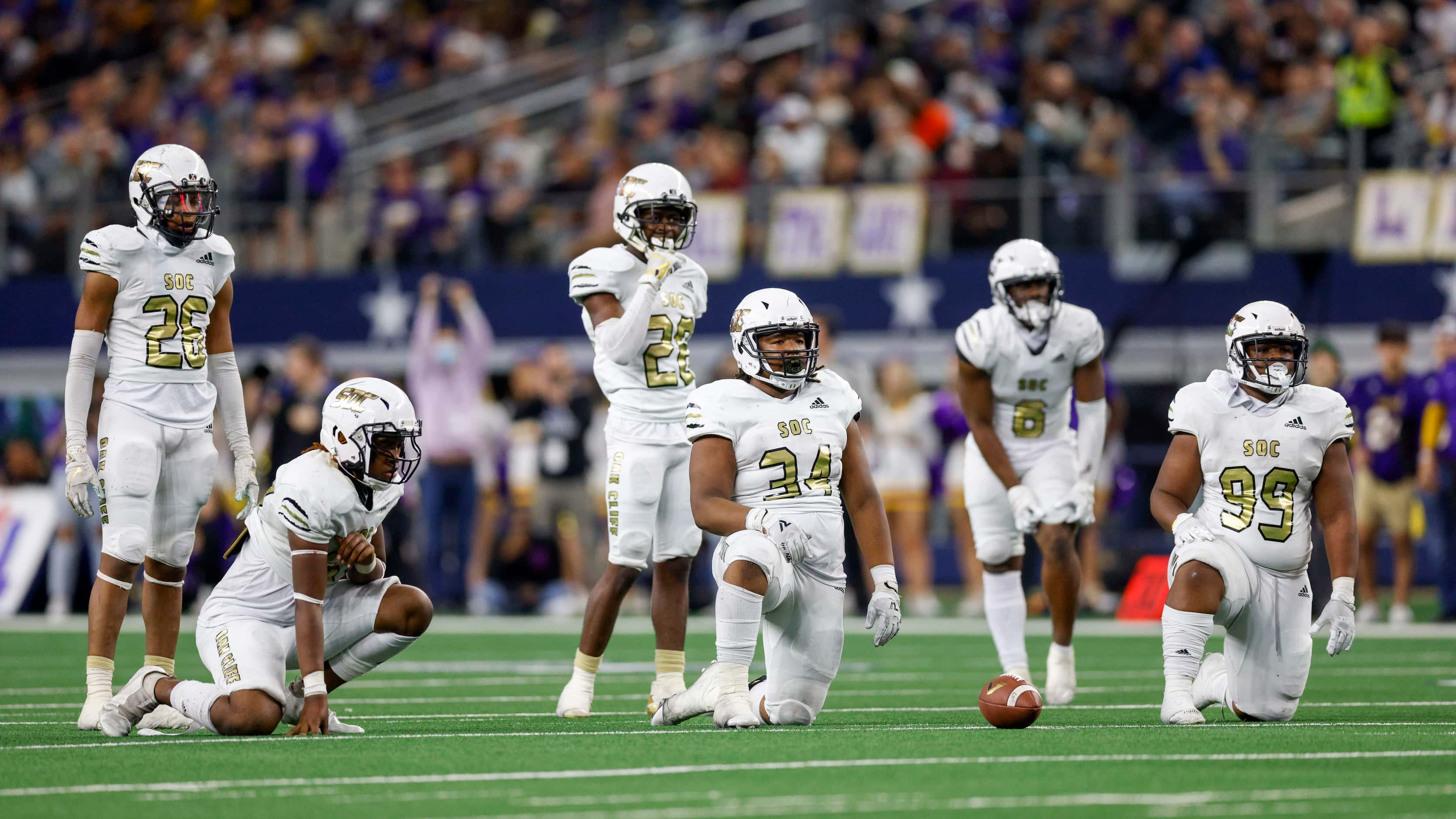 The South Oak Cliff defense waits for the snap during the second half of their Class 5A...