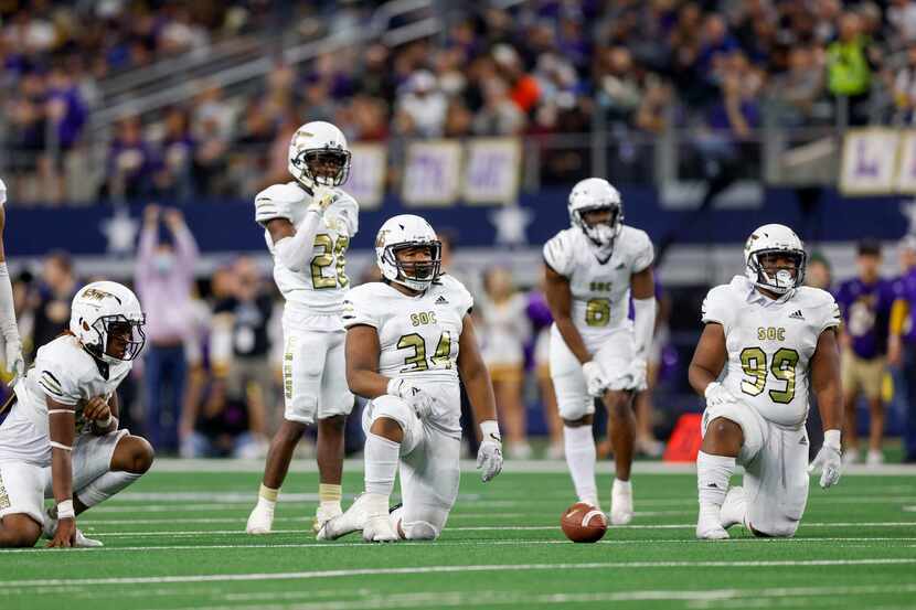 The South Oak Cliff defense waits for the snap during the second half of their Class 5A...