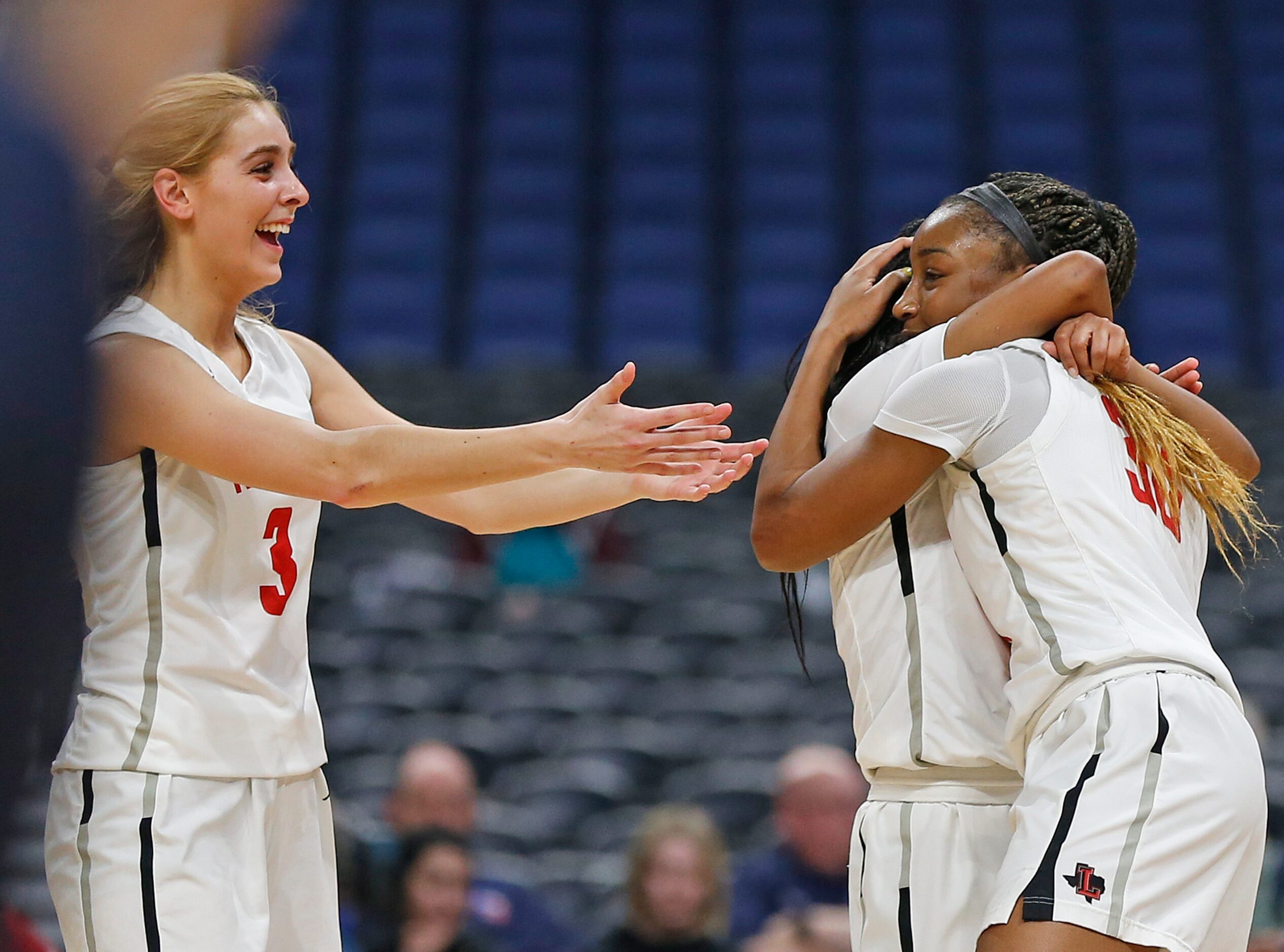 Frisco Liberty guard Lily Ziemkiewicz #3 reaches out to teammates as Frisco Liberty guard...