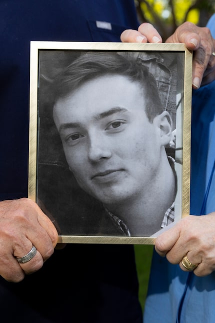 Daragh and Judie Heitzman hold a photo of their son, Martin, who died a year ago of fentanyl...