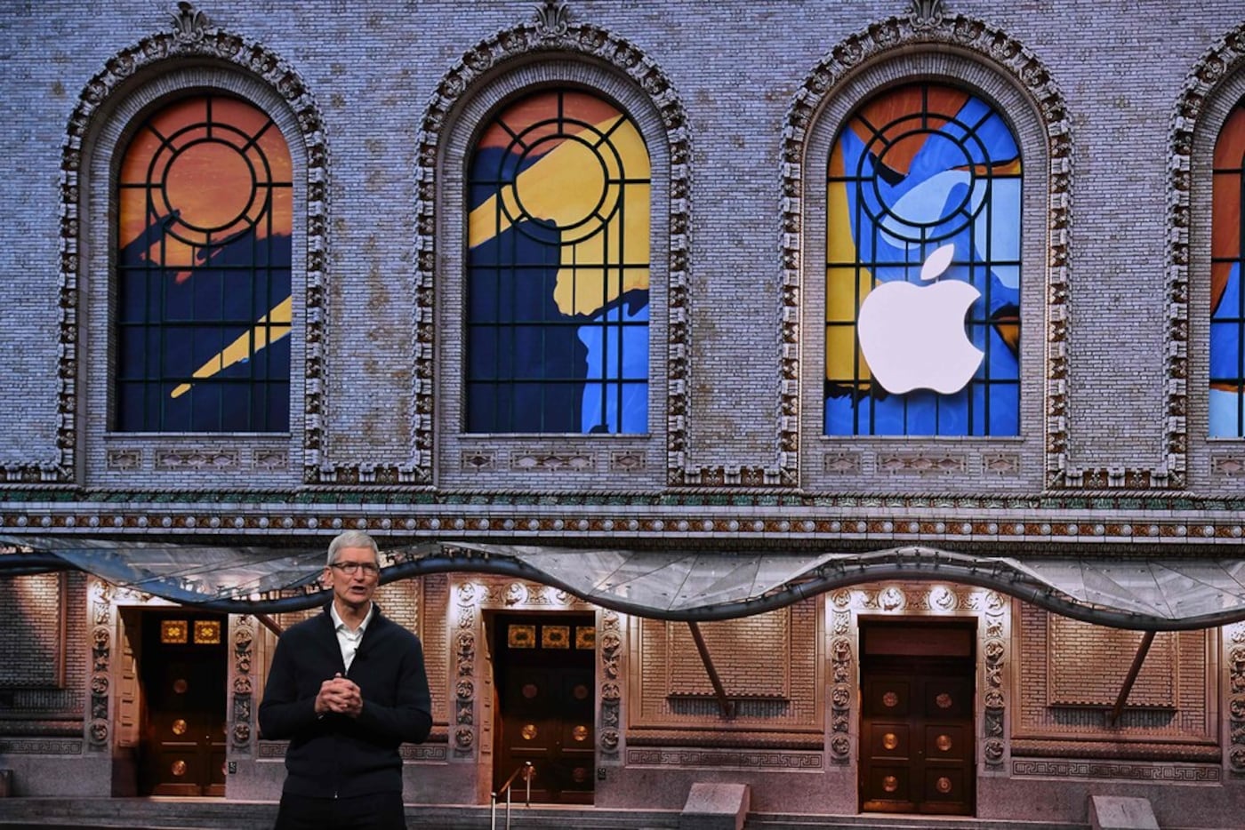 Apple CEO Tim Cook presents new products, including new Macbook laptops, during a special...