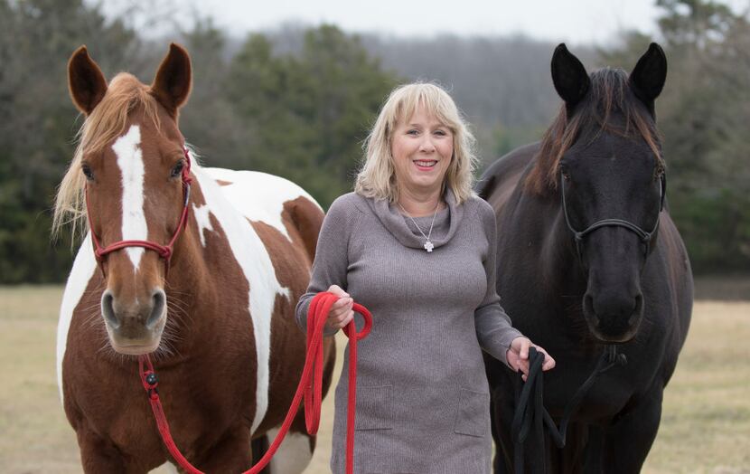 Brenda Rizos, a Lovejoy ISD activist, with two of her horses on her Lucas, Texas property on...