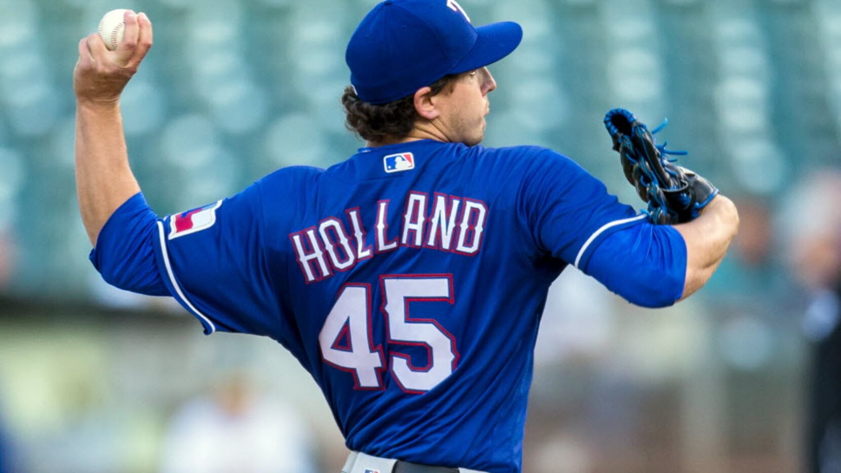 May 16, 2016; Oakland, CA, USA;  Texas Rangers starting pitcher Derek Holland (45) throws...