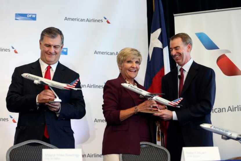 
Dallas Mayor Mike Rawlings and Fort Worth Mayor Betsy Price joined then-American Airlines...
