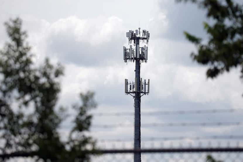 This cell tower on Bridge Street in Fort Worth on Tuesday was one of dozens of towers across...