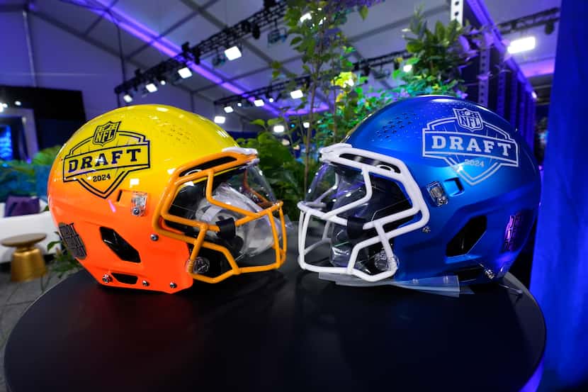 Helmets are displayed in the NFL Draft green room, Wednesday, April 24, 2024, in Detroit.