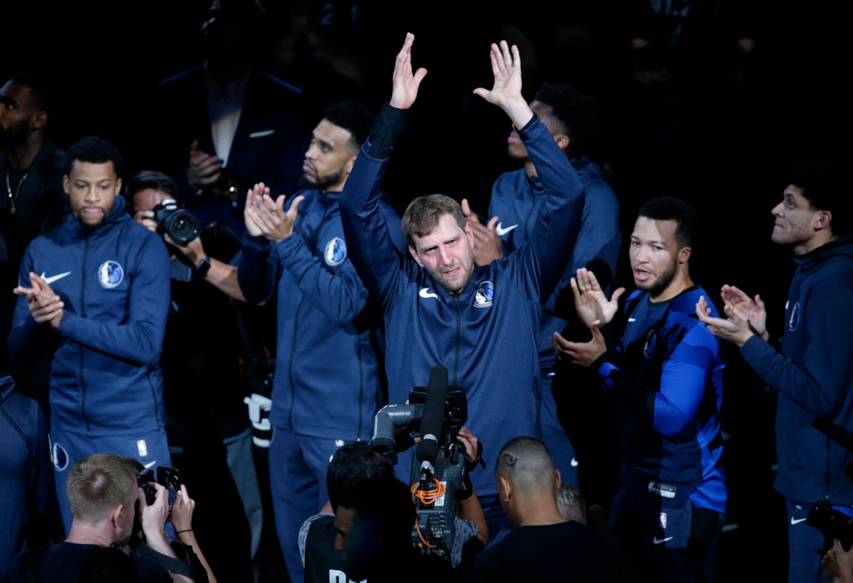 Dallas Mavericks forward Dirk Nowitzki (41) cries during a video tribute before the game...