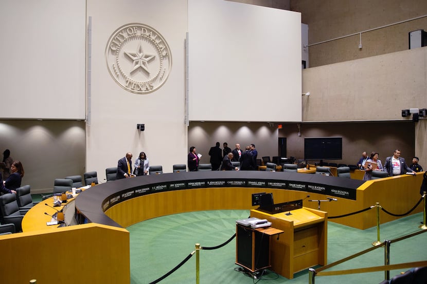 Dallas City Council members adjourn a council meeting at Dallas City Hall in Dallas on June...