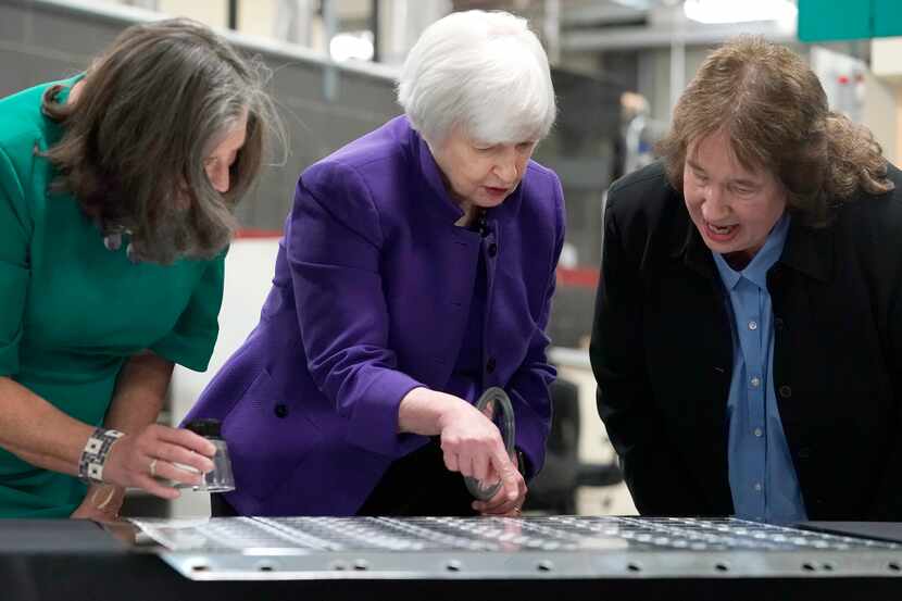 Treasury Secretary Janet Yellen, center, and U.S. Treasurer Lynn Malerba, left, inspect...