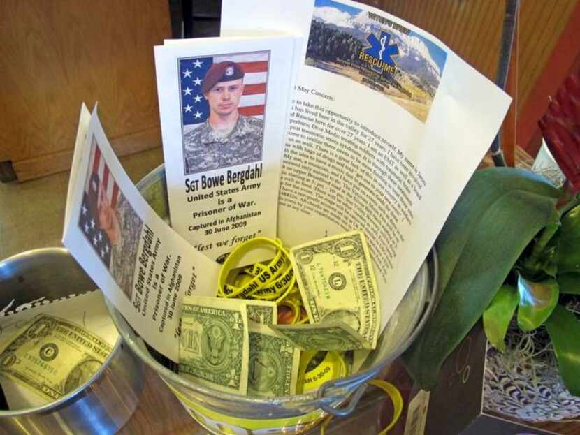 
A donation bucket for the family of Sgt. Bowe Bergdahl sits on the counter of a coffee shop...