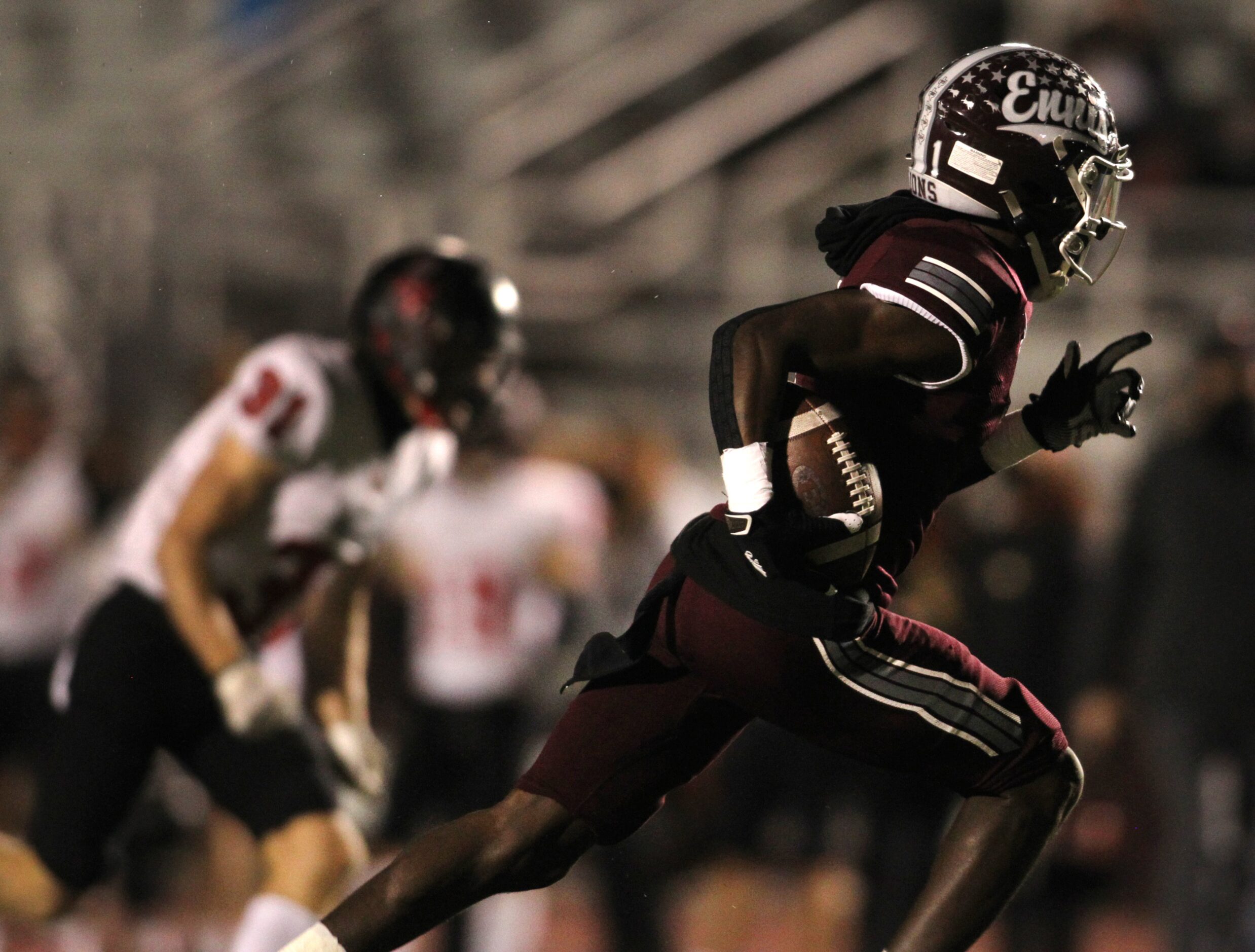 Ennis receiver Karon Smith (1) is off-to-the-races after turning  a crossing route to a...