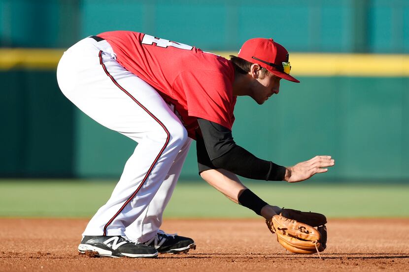 Third baseman Joey Gallo, takes fielding practice as he debuts for the Frisco Roughriders at...
