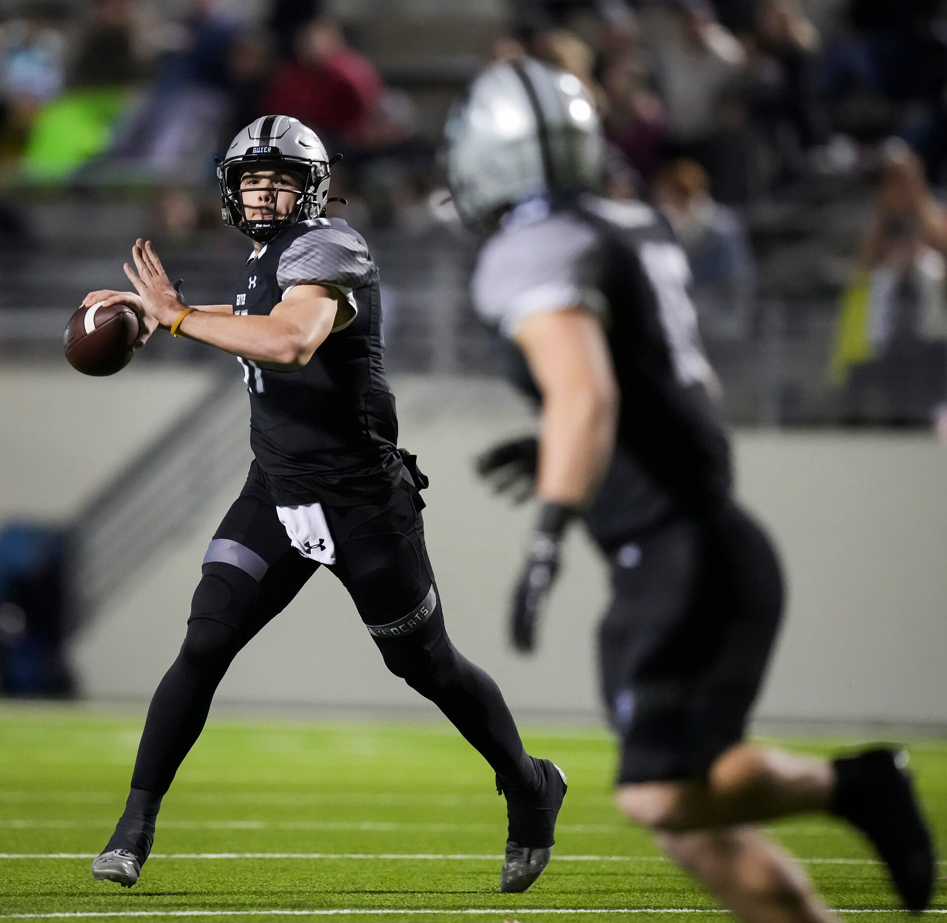 Denton Guyer quarterback Jackson Arnold (11) throws a pass to running back Jackson Foster...