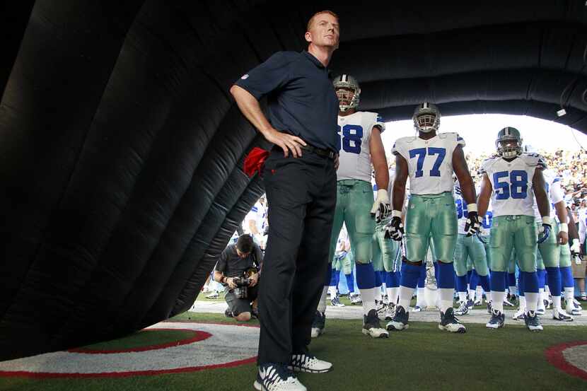 Dallas Cowboys head coach Jason Garrett waits in the tunnel with his players before being...