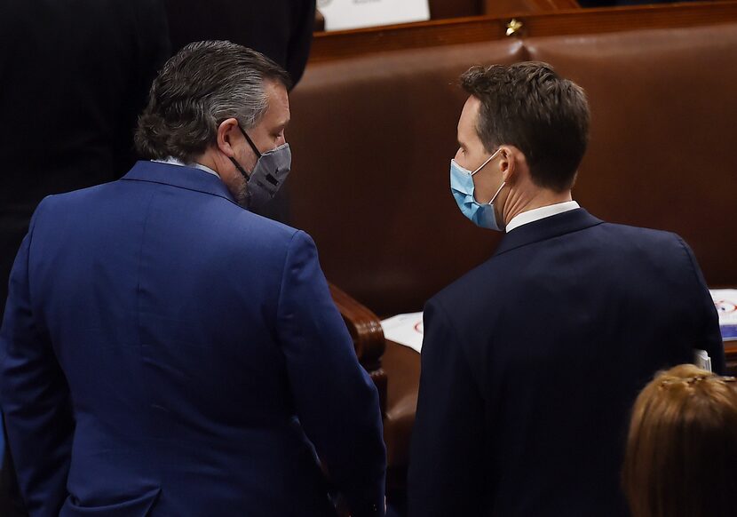 Sen. Ted Cruz of Texas, left, speaks with Missouri Sen. Josh Hawley during a joint session...