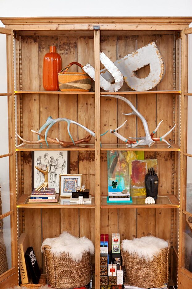 Abbe Fenimore says layering is key to a sophisticated bookcase. Lean a framed piece of art...