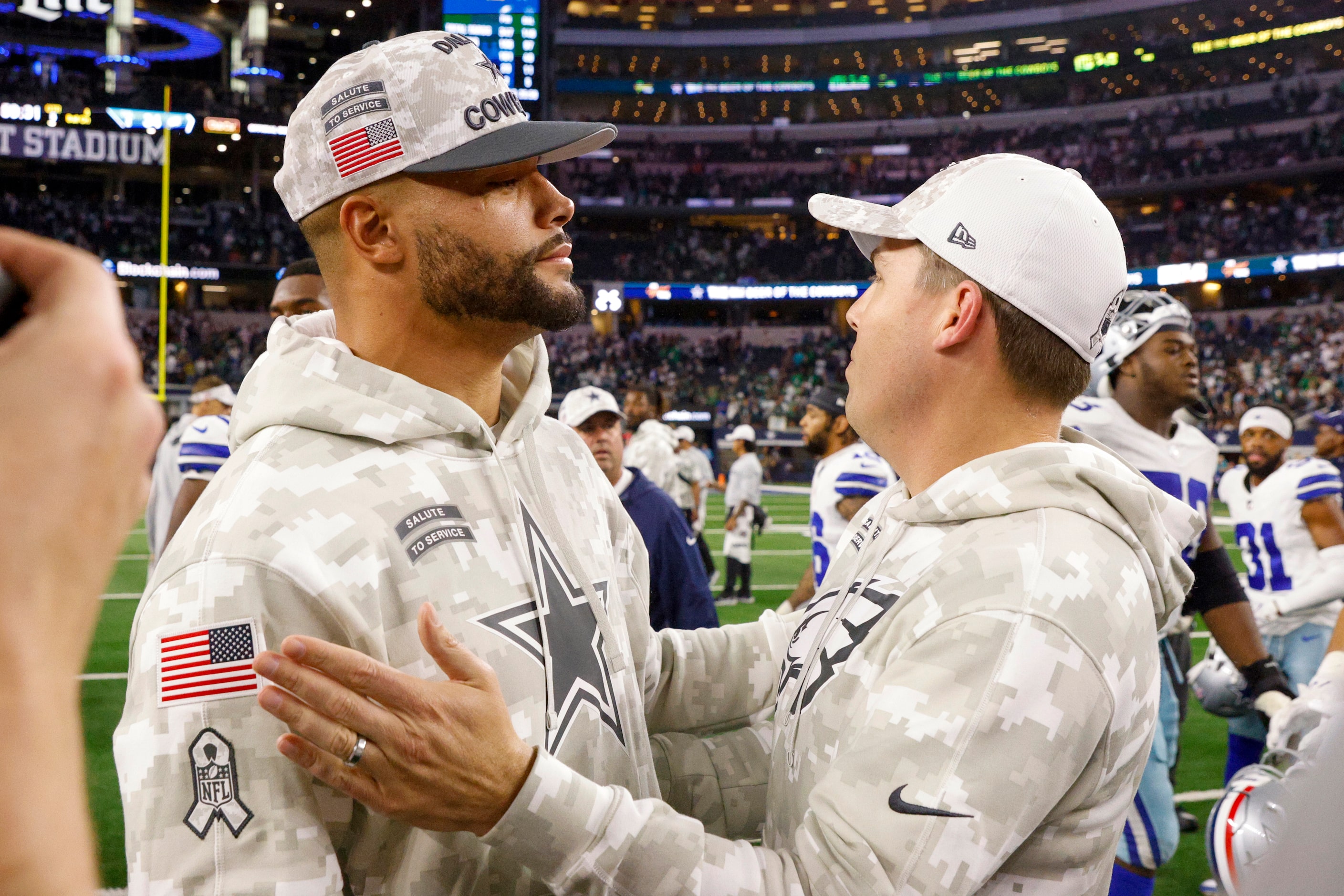 Dallas Cowboys quarterback Dak Prescott embraces former Cowboys offensive coordinator and...