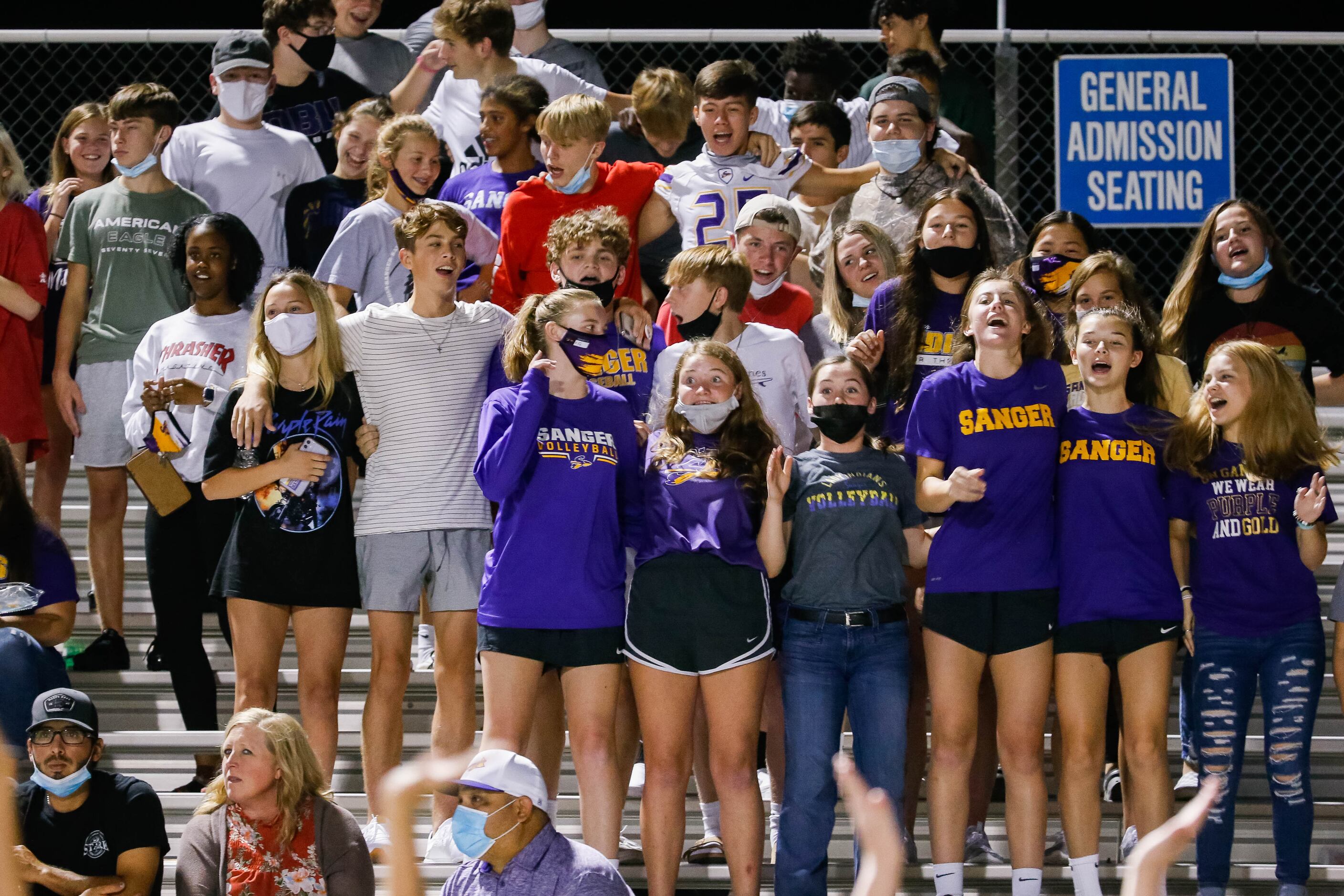 Sanger High School students watch a game against Lake Worth High School's during the second...