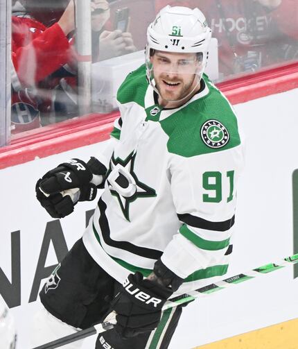 Dallas Stars' Tyler Seguin reacts after scoring against the Montreal Canadiens during third...
