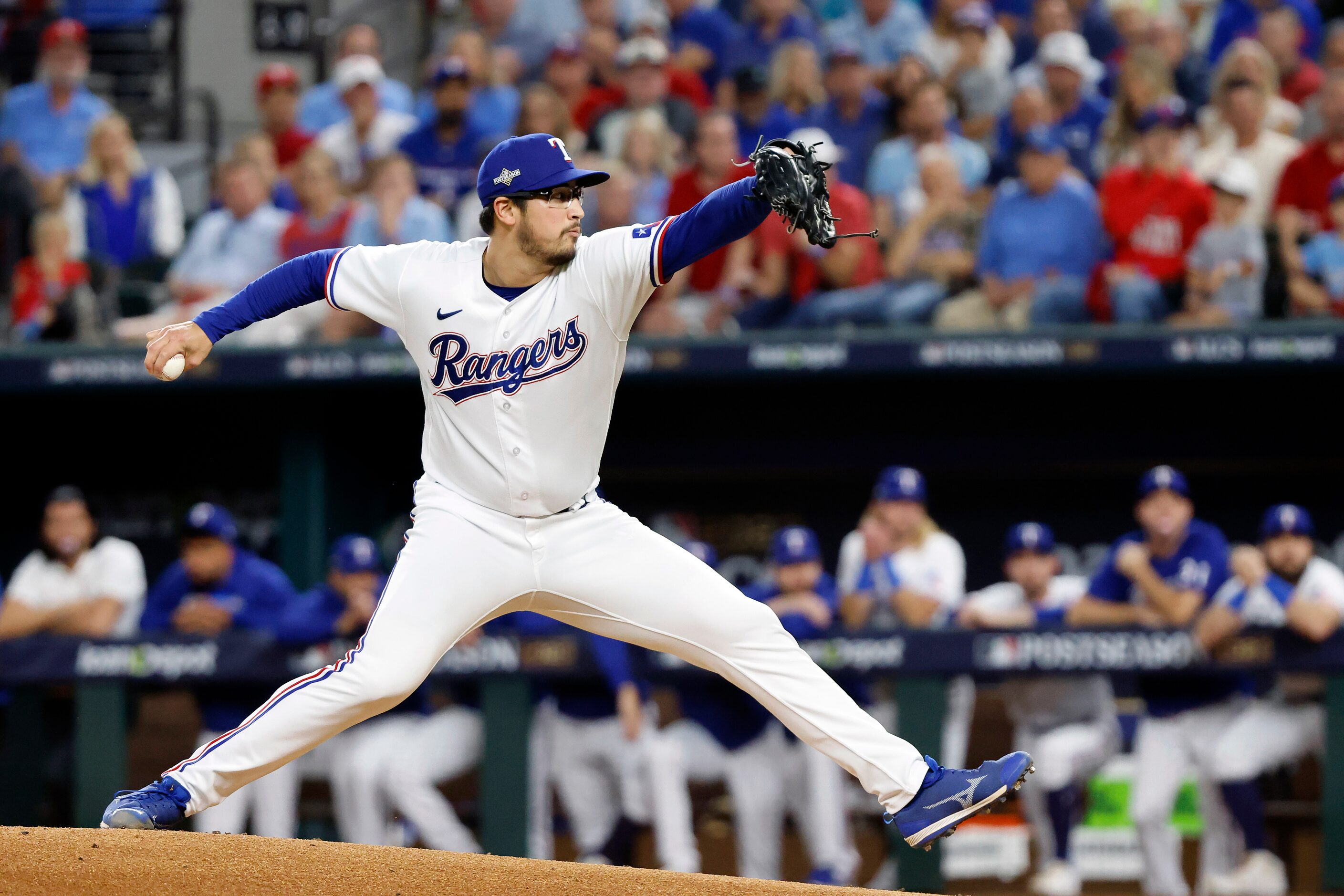 Texas Rangers starting pitcher Dane Dunning (33) throws during the first inning in Game 4 of...