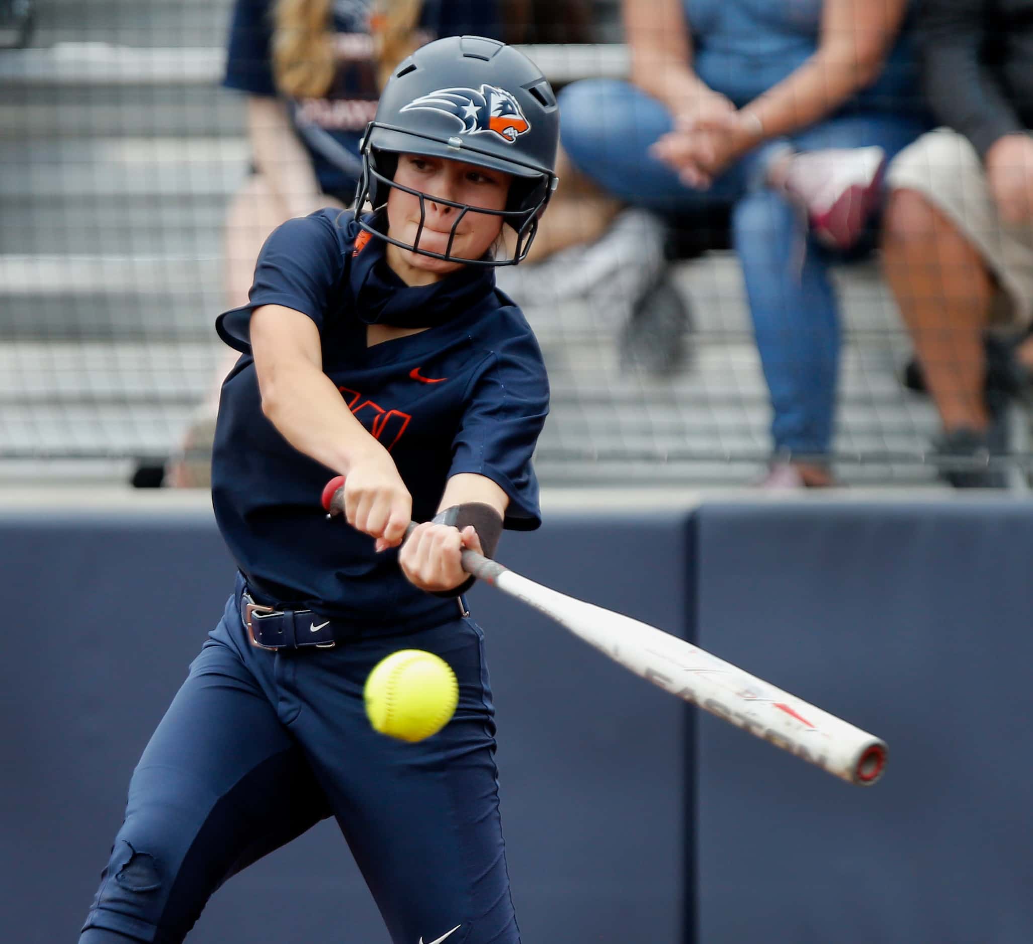 Wakeland shortstop Lily Acuna (2) makes contact in the fifth inning as Lovejoy High School...