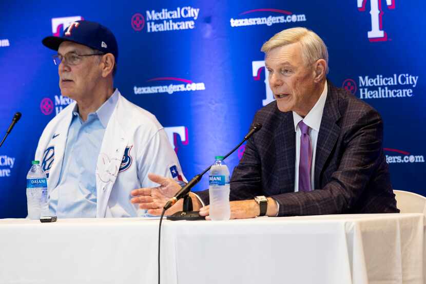 Texas Rangers owner Ray Davis (right) speaks at a press conference introducing new Texas...