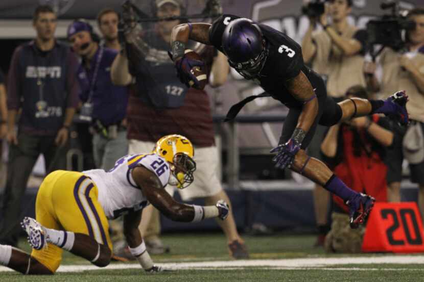 TCU Horned Frogs wide receiver Brandon Carter (3) breaks free from LSU Tigers safety Ronald...