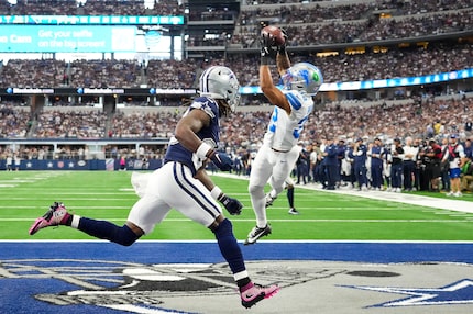 Detroit Lions safety Brian Branch (32) intercepts a pass intended for Dallas Cowboys wide...