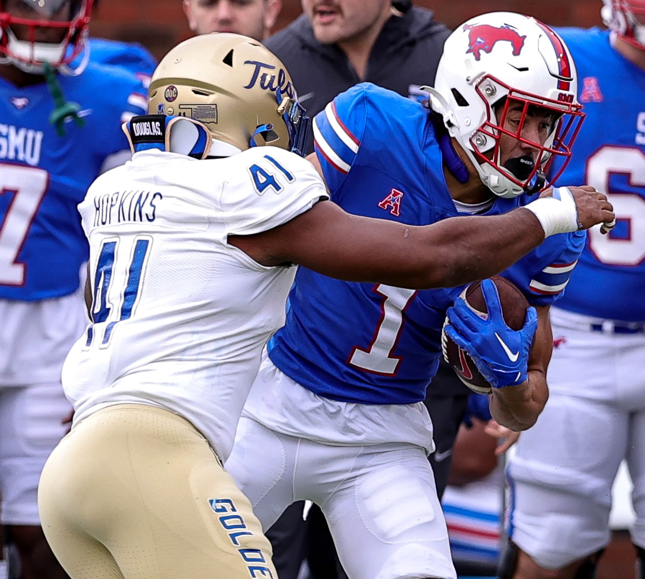 SMU wide receiver Jordan Kerley (1) comes up with a reception against Tulsa linebacker...