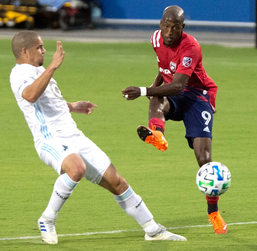 FC Dallas forward Fafa Picault (9) scores the games first goal during the first half as FC...