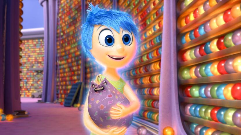 In this image released by Disney-Pixar, the character Joy, voiced by Amy Poehler, appears in...