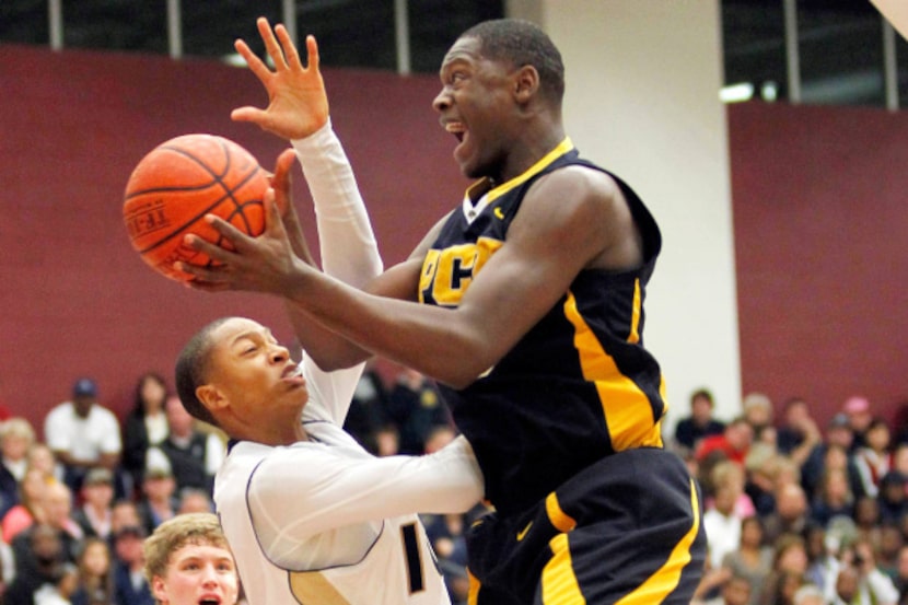 Prestonwood Christian's Julius Randle, a nationally recruited forward, drives to the basket...