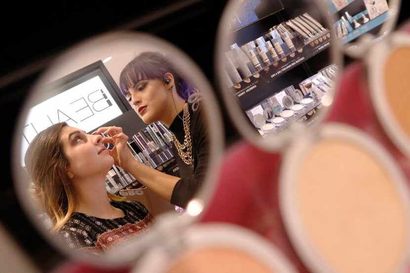 Taylor DeBoef, 18, left, has a make over with Beauty Advisor, Halie Arreaga at Kohls in...
