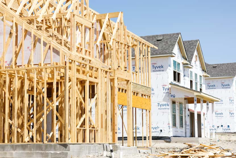 Houses under construction in Woodcreek neighborhood, the largest housing development in Fate.