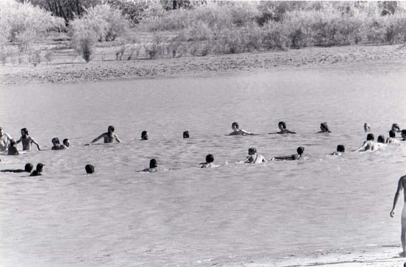 Festivalgoers skinny-dip at Lewisville Lake.