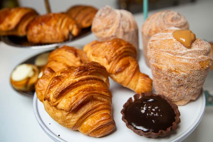 Pastries, including croissants, chocolate caramel tart and churro cruffins, at La Casita...