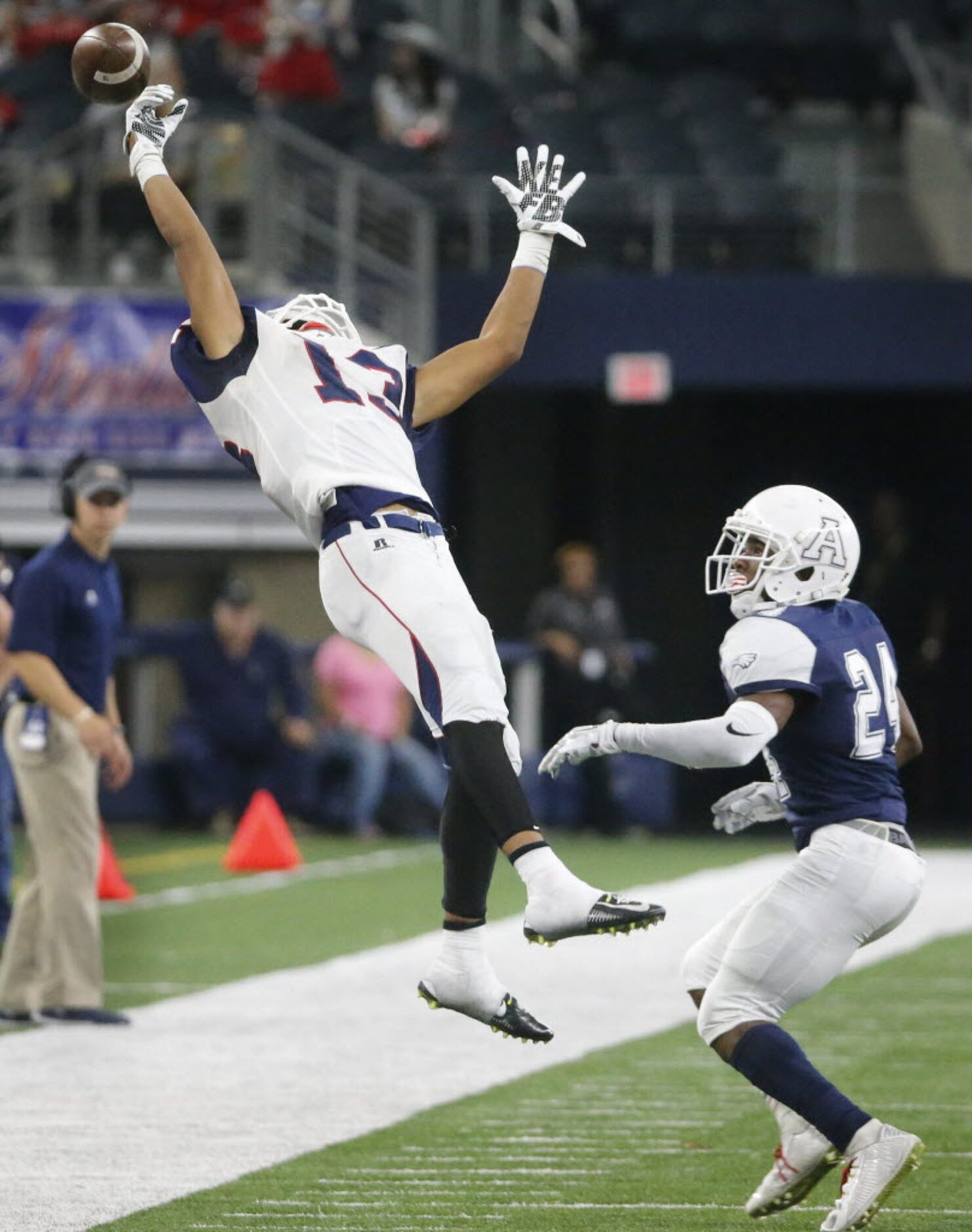 Denton Ryan receiver BJ Lau (13) can't quite reach a pass along the sidelines as Colton...