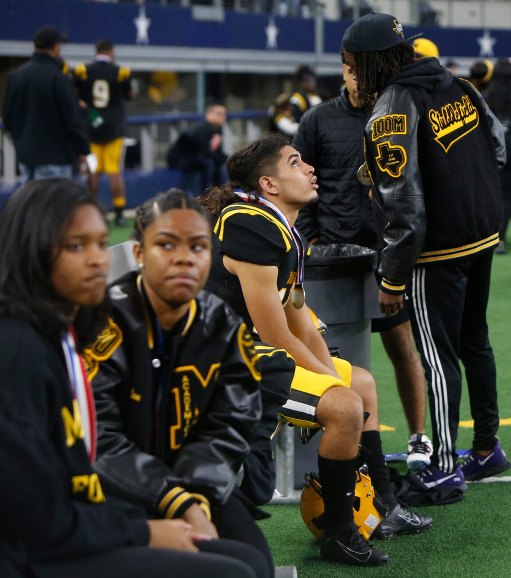 Fort Bend Marshall receiver Xavier Rojo (13) glances up at the scoreboard following his...