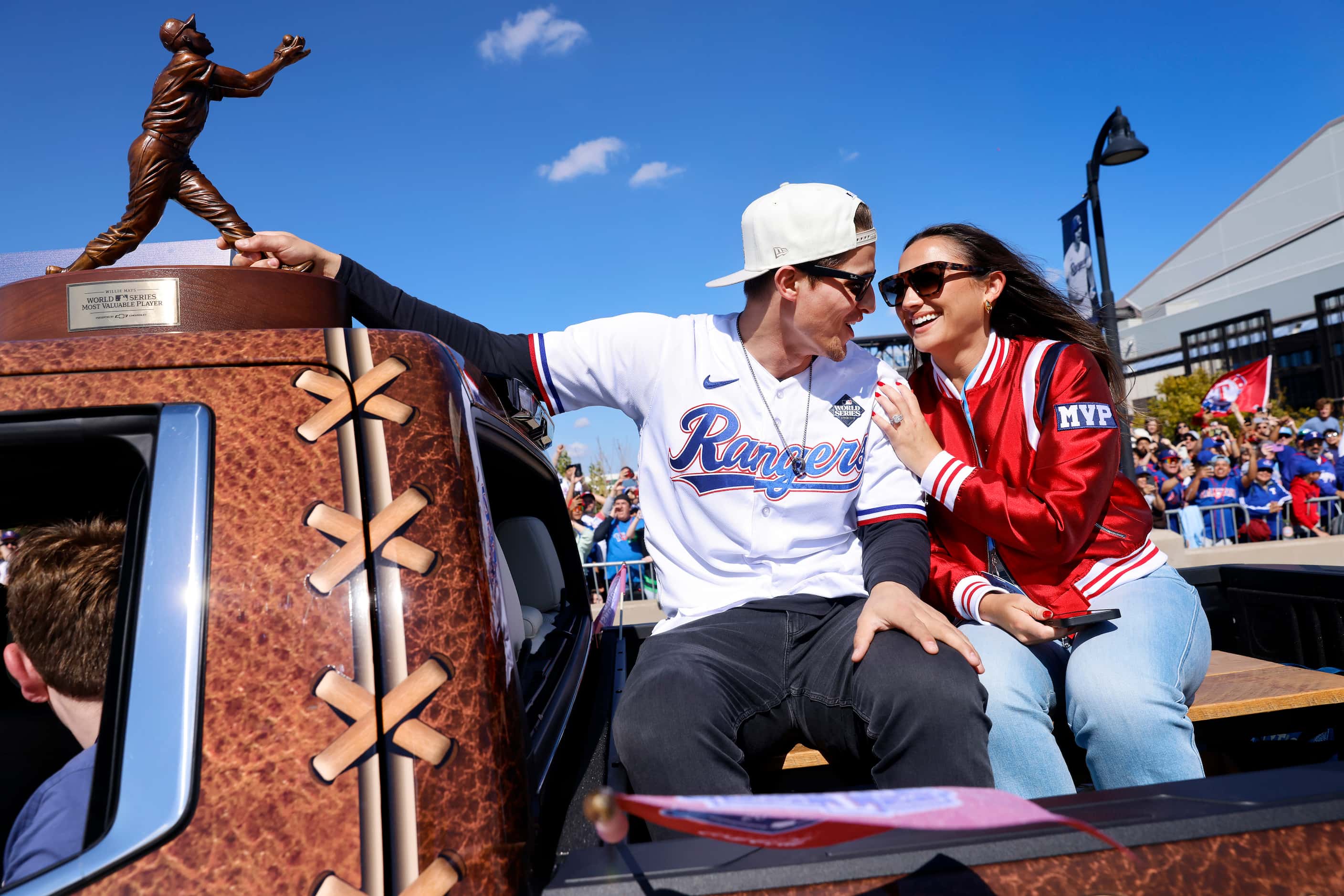 Texas Rangers shortstop Corey Seager and his wife Madisyn Seager ride with his Most Valuable...