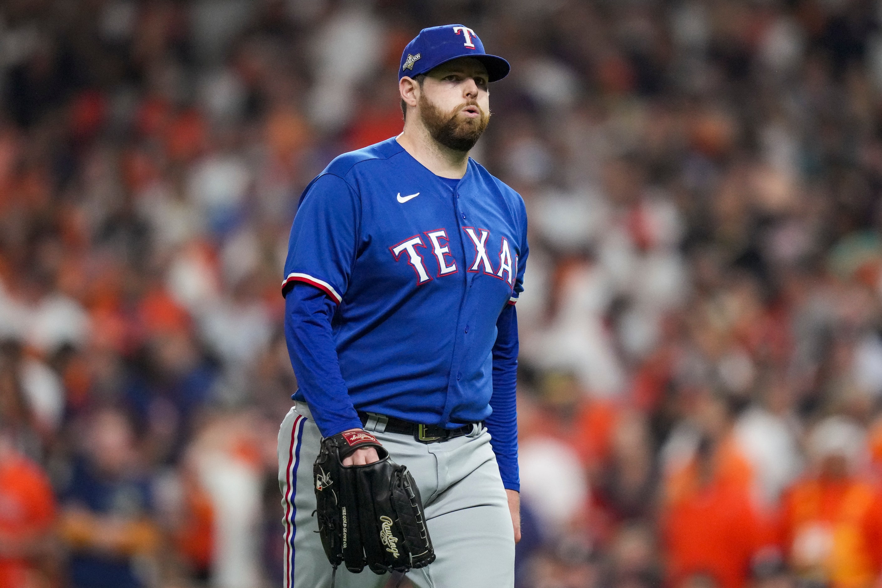 Texas Rangers starting pitcher Jordan Montgomery exhales after Houston Astros left fielder...