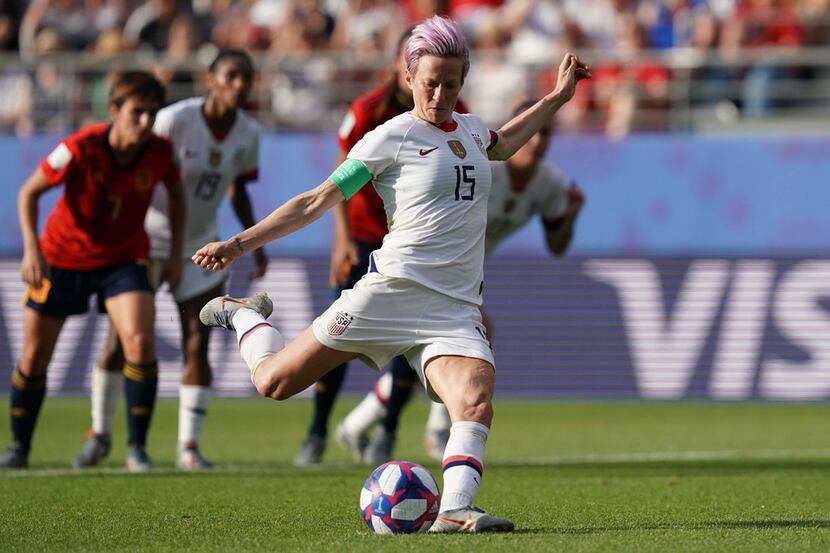 TOPSHOT - United States' forward Megan Rapinoe scores a goal during the France 2019 Women's...