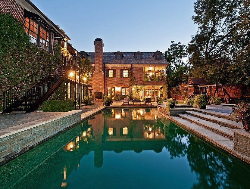 The home's guest house overlooks the pool and yard.