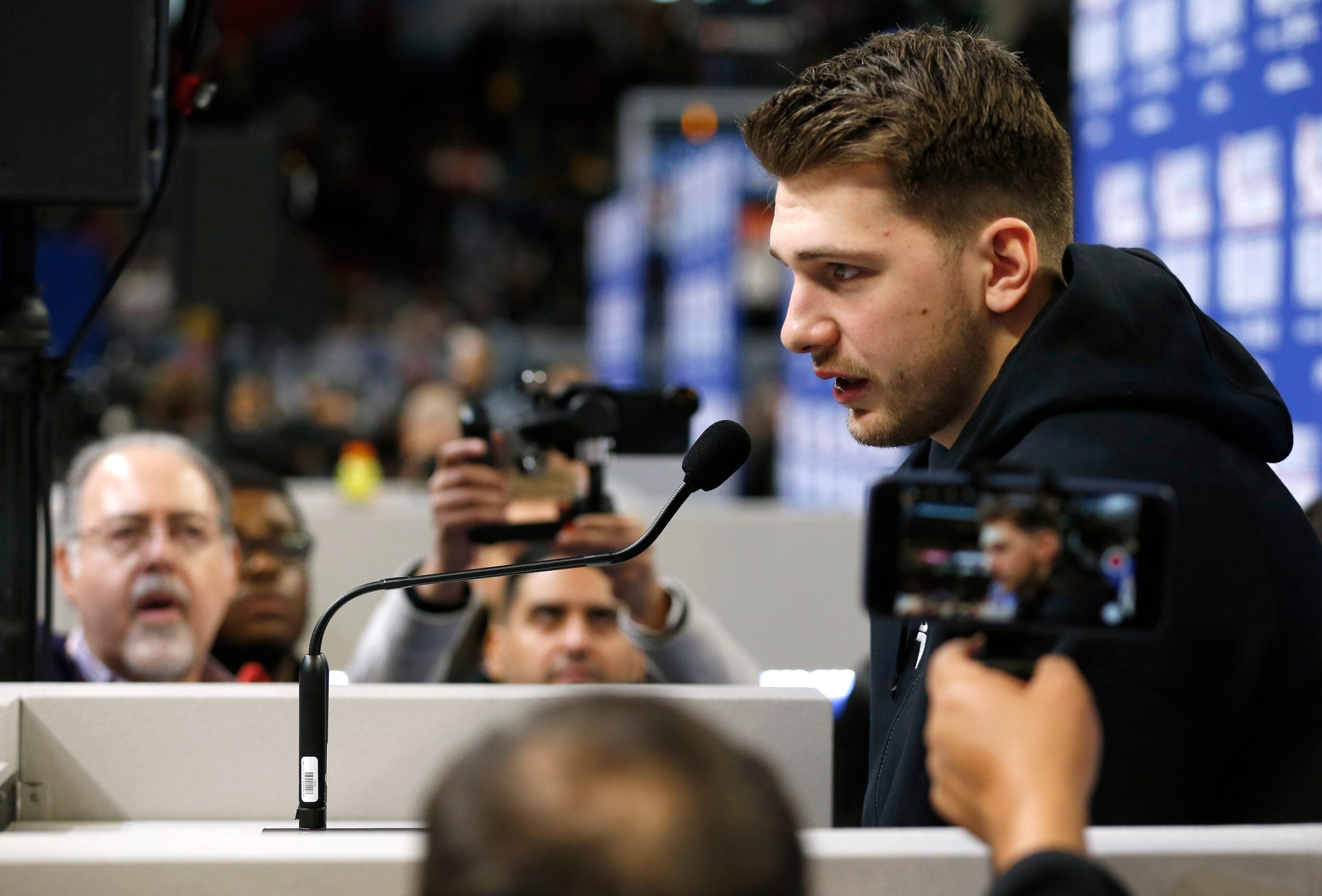 Team LeBron's Dallas Mavericks forward Luka Doncic (2) answers questions from the media...