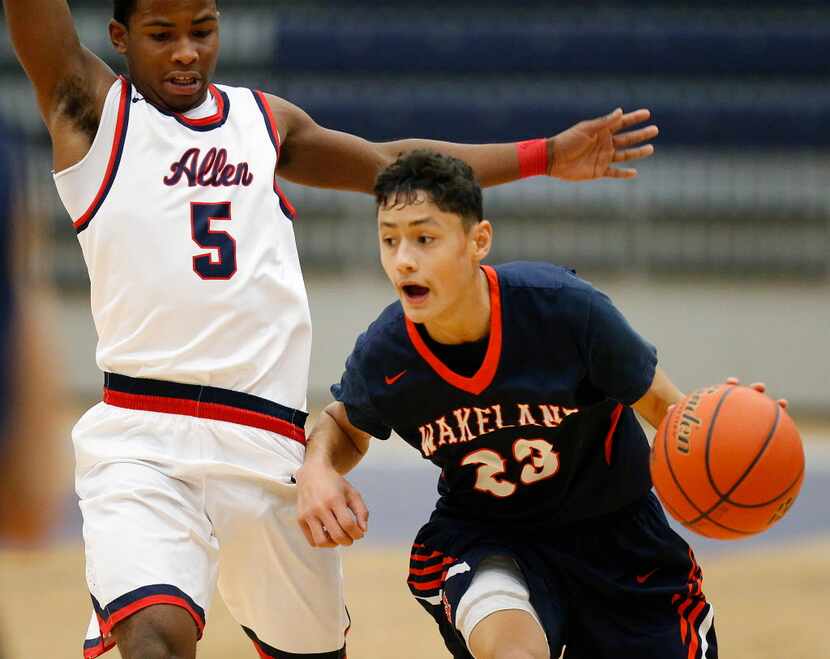 Wakeland gaurd Javante McCoy (23) brings the ball up the court as he is pressed by Allen...