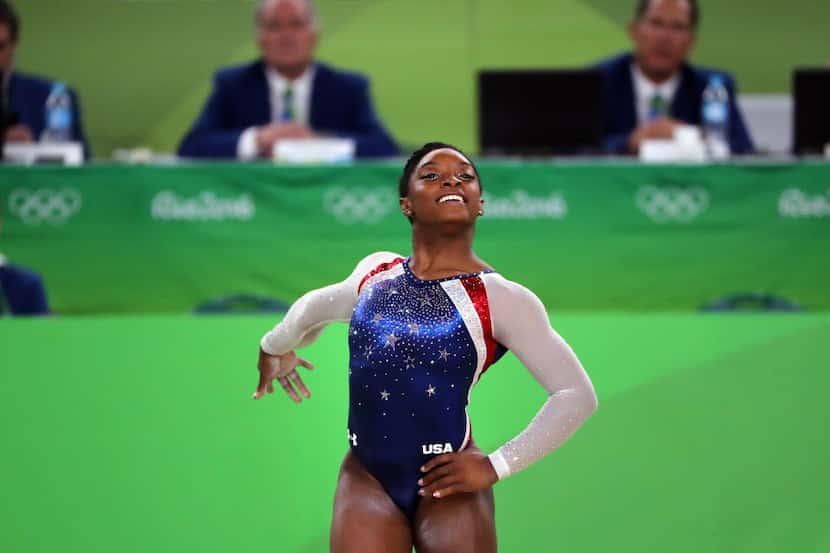 Simone Biles from Spring, Texas, competes in the floor exercise in the women's All-Around...