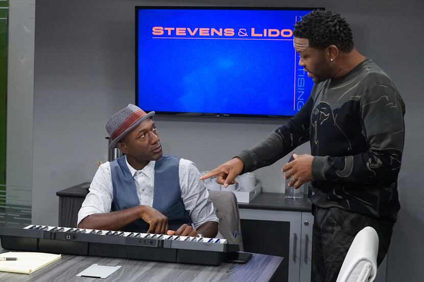 Musician Aloe Blacc, left, and Anthony Anderson appear in the "Juneteenth" episode of...