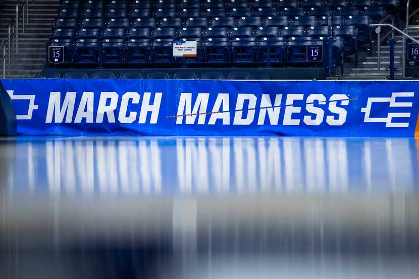 March Madness branding near the court before a first-round college basketball game between...