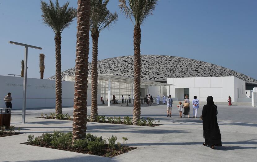 Patrons visit the Louvre Museum, during the public opening day, in Abu Dhabi, United Arab...